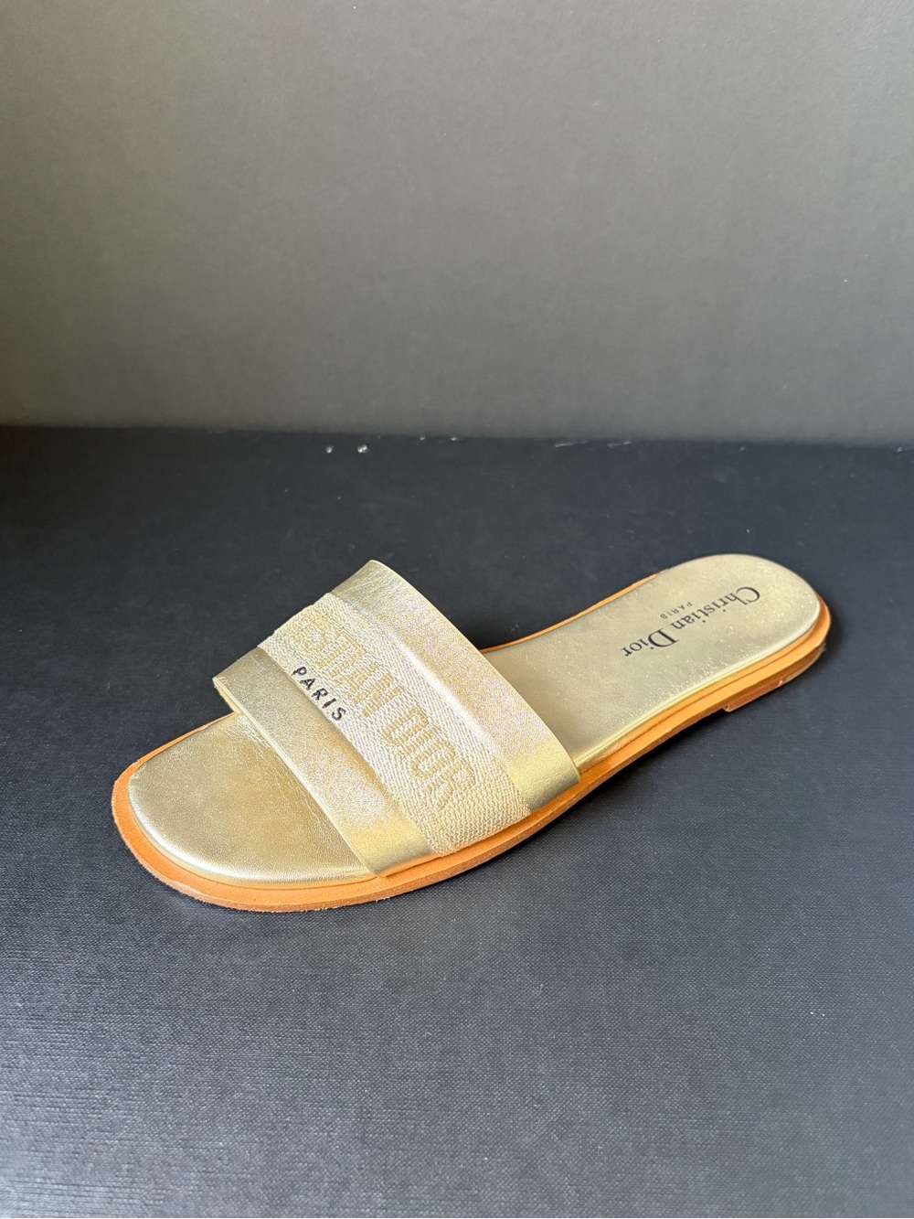 CHRISTIAN DIOR gold slides